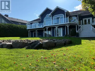 Welcome to this stunning waterfront rental located in the highly sought-after Gilwood Park area of P...