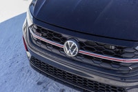 Propel your daily drive with the exceptionally dynamic 2024 Volkswagen Jetta GLI. This Deep Black Pe... (image 8)