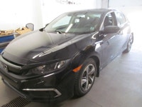 Built to deliver everyday value, this 2021 Honda Civic Sedan LX is a smart compact car with the comf... (image 1)