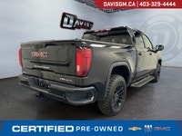 The 2023 GMC Sierra 1500 AT4X Crew Cab Short Box 4WD represents the ultimate expression of off-road... (image 4)