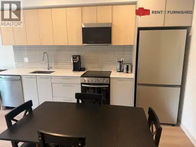 Indulge in the refined living of this furnished condo in North Vancouver, where modern design meets...