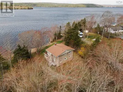 Welcome to attainable lakefront living on Grand Lake in Oakfield. Set in Sandy Cove, 4 Parkview Driv...