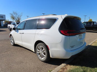 The 2022 Chrysler Pacifica Touring AWD blends family-focused practicality with confident all-weather... (image 5)
