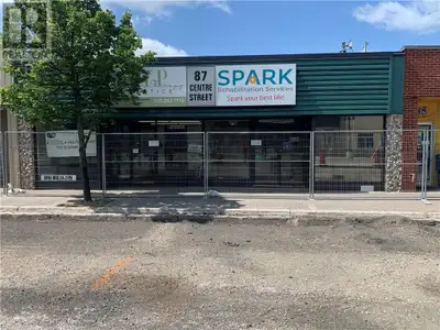 Attention investors, fully rented commercial building in Espanola, next to Credit Union, windows and...
