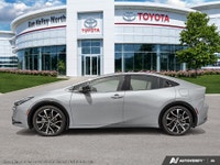 Introducing the stunning 2027 Toyota Prius Plug-In Hybrid XSE in a sleek silver finish with a smooth... (image 2)