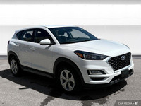 The 2020 Hyundai Tucson in Crystal White features all-wheel drive with advanced safety like lane dep... (image 7)