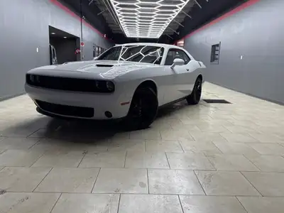 Experience the thrill of driving the 2020 Dodge Challenger SXT in stunning White. This RWD coupe bri...