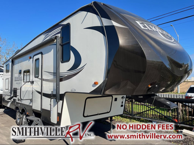 Preowned fifth wheel with bunks! Features: Sleeps up to 8 Kitchen includes fridge/freezer, microwave...
