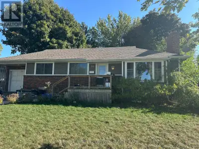Stylish Bungalow with Separate In-Law Suite in a Prime Kingston Pocket. Crisp, contemporary, and tur...