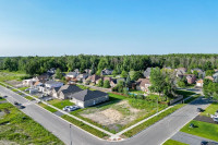 Fully serviced and ready to build on corner lot in Riverdale!