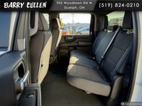 The 2026 Chevrolet Silverado 2500HD Custom is a striking white truck with a powerful 44 drivetrain t... (image 5)