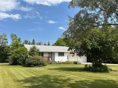 R32//Strathclair/Parklike 2.58 acres parcel is zoned part residential and part farm land, meaning yo...