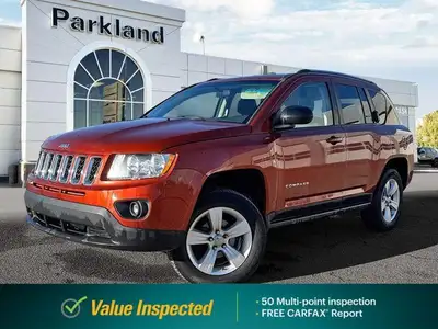 Adventure meets everyday comfort in this *2012 Jeep Compass Sport*, finished in eye-catching *Copper...
