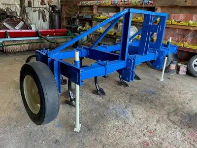 Welcome to Stoneage Equipment Selling this 9 tooth chisel plow with gauge wheels. It's 3 point hitch...