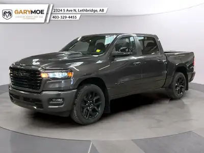 The 2026 Ram 1500 Sport, presented in a sophisticated gray finish, offers powerful 44 capabilities c...