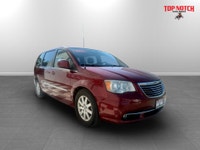 A spacious family minivan with comfortable seating, convenient features, and versatile cargo space,... (image 2)