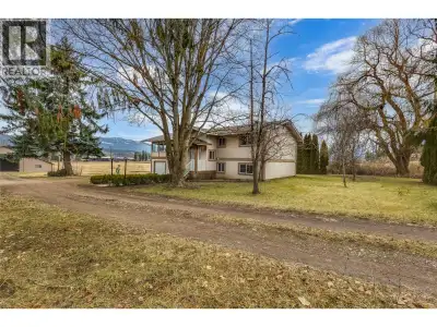 Beautiful Shuswap River waterfront property! 30 acre irrigated farm with 5 bedroom, 2 bath house wit...