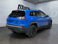The 2021 Jeep Cherokee Trailhawk Elite 4x4 combines rugged off-road strength with premium comfort, a... (image 4)