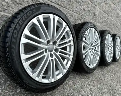 Pirelli Winter Sottozero3 AO Snow Tires and original 18 inch Audi A5 / S5 silver rims. Good for all...