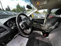 The 2015 Dodge Grand Caravan SXT is a versatile minivan designed to deliver family-friendly comfort,... (image 8)