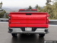 Conquer any road and turn heads with the vibrant Red Hot 2025 Chevrolet Silverado 1500 LT Crew Cab P... (image 3)