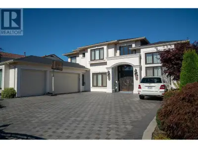 Magnificent luxury home in the prestigious Quilchena, built in 2017 and offering a like-new living e...