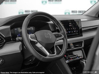 The 2025 Volkswagen Taos Trendline in a sophisticated shade of gray is an all-wheel-drive SUV ready... (image 7)