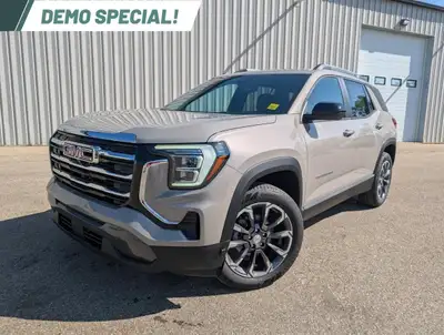 The 2026 GMC Terrain FWD Elevation is presented in a sleek gray finish with a front-wheel-drive driv...