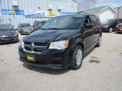 All our listed prices are cash price plus tax. 2015 Dodge Grand Caravan SE comes with Cloth Interior...