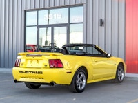 Carget Supercentre is proud to present this 2003 Ford Mustang GT Convertible! EXTERIOR: ZINC YELLOW... (image 7)