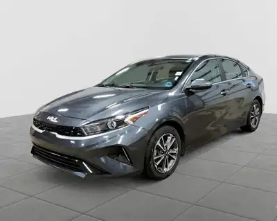 Experience the perfect blend of modern sophistication and fuel-efficient performance in the 2023 KIA...