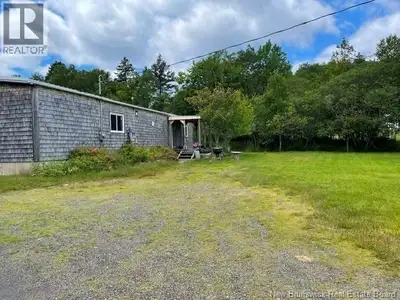 Rustic charm on the outside and nicely renovated with a sleek modern look on the inside, this countr...
