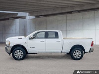 Command attention with this remarkable 2023 Ram 3500 Laramie Crew Cab, a freshly acquired trade-in t... (image 3)