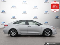 Odometer is 1478 kilometers below market average! Gray 2025 Toyota Corolla Hybrid LE AWD Continuousl... (image 5)