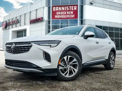 Experience unparalleled style and capability with the 2023 White Buick Envision Essence. This all-wh...