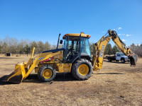JD 410G Backhoe Available in a Timed Online Auction