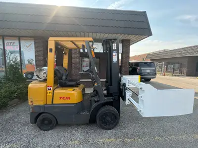 This is a really good TCM 5000lb capacity cushion tire forklift. As can be seen, it has a Bale Clamp...