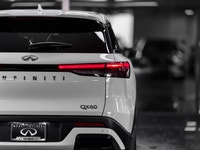 Elevate your driving experience in the sophisticated 2025 INFINITI QX60 Pure, finished in striking G... (image 5)