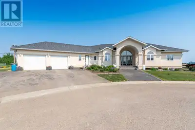 Step into timeless elegance with this meticulously crafted 2400 sq ft bungalow, built in 2006 and ne...