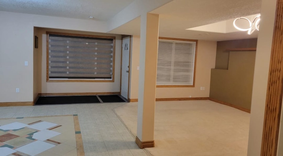 Bright & Spacious 3-Bedroom Legal Walkout Suite in Arbour Lake 3