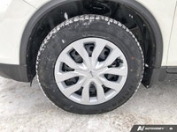 This Nissan Rogue boasts a Regular Unleaded I-4 2.5 L/152 engine powering this Variable transmission... (image 9)