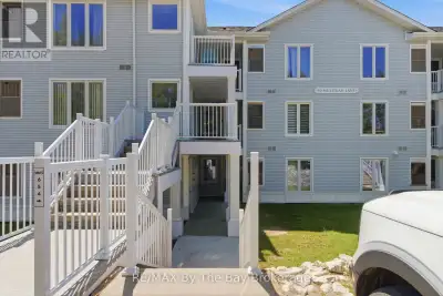 Sunny and bright GROUND floor END unit siding onto Marlwood Golf Course in Wasaga. This unit feature...