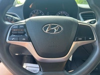 The 2020 Hyundai Accent Essential in an eye-catching blue finish offers a smooth FWD driving experie... (image 8)