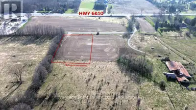 Prime commercial opportunity in Rockford, Ontario! This C4-zoned lot, spanning just under 2 acres, o...
