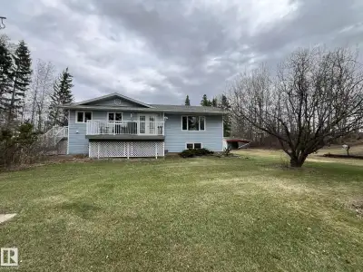 Country roads lead you home to this beautiful acreage, where you will find a thoughtfully designed 3...