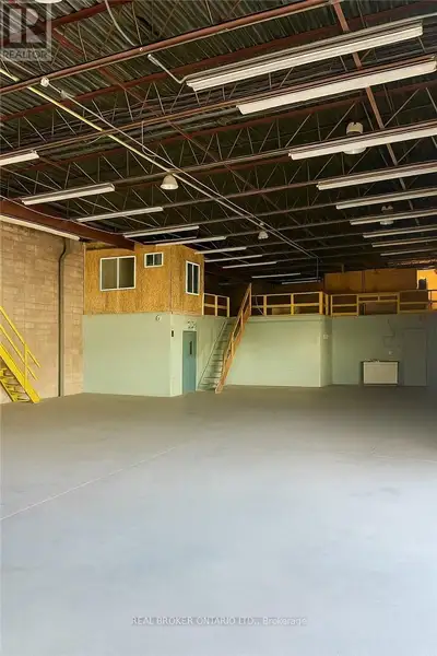 5,081 SF industrial unit with 16 ft clear height and a predominantly open warehouse configuration. U...