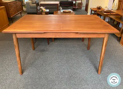 OUTSTANDING DANISH TEAK DRAW LEAF DINING TABLE AT CHARMAINE'S, View more