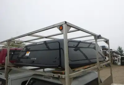 Nissan titan This top of the line truck cap comes with tinted frameless glass on sides and rear door...
