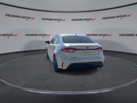 This used 2025 Toyota Corolla SE 2WD | Sunroof | Heated Steering Wheel is a smart hybrid sedan for d... (image 6)