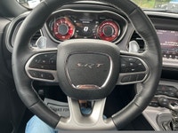 The 2023 Dodge Challenger SRT Hellcat Jailbreak in a stunning purple hue captivates with its rear-wh... (image 9)